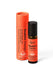 Red Positive Energy Pulse Point Roll on next to product packaging on white bacground