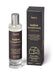 Black Indian Sandalwood room mist displayed next to product packaging by Aery on white bacground